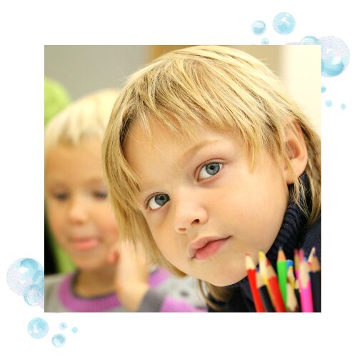 A young boy in class who knows how it feels to have dyslexia.